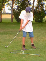 kidchip_backswing2.JPG (46770 bytes)