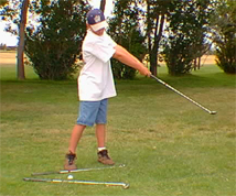 kidpitch_followthru.JPG (55338 bytes)